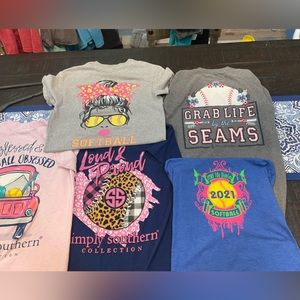 Lot of softball shirts